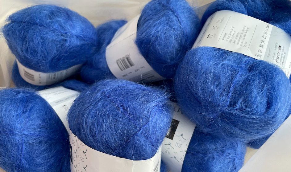 A bundle of cobalt blue thick mohair yarn.