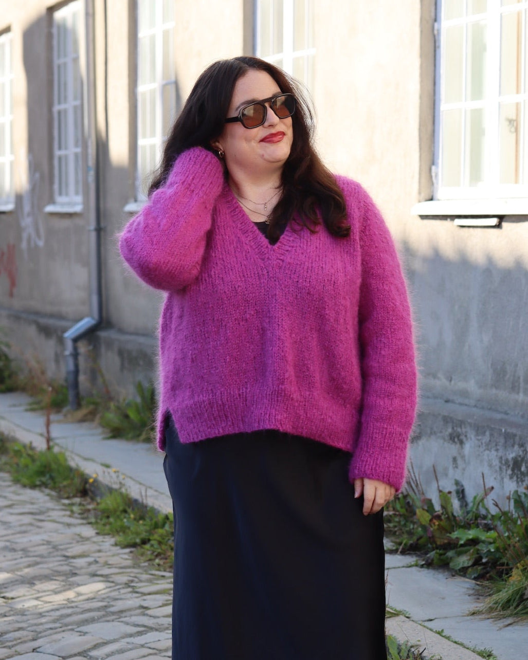Knitted sweater from Dreamknit's design tool, made with Un-told Fuzzy Mohair in the color Cool Berry
